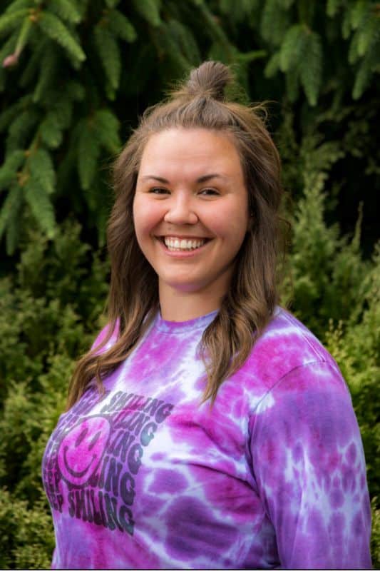 a woman smiling at camera