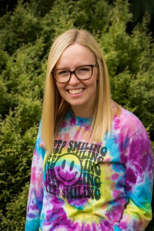 a woman smiling at camera