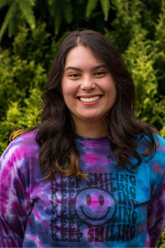 a woman smiling at camera