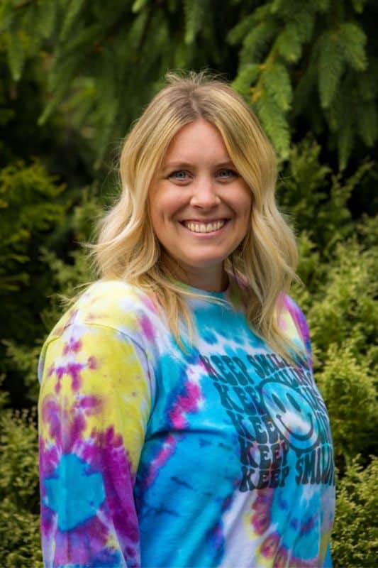 a woman smiling at camera